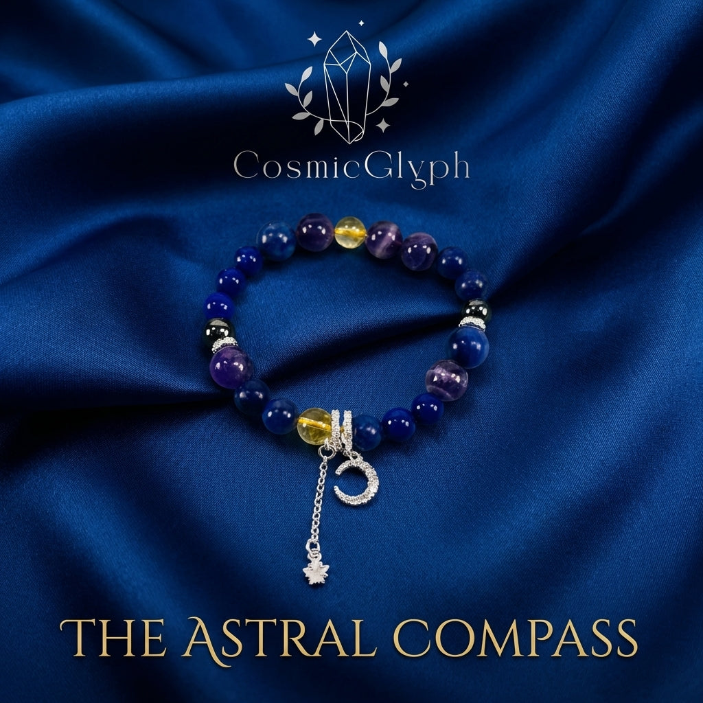 The Sagittarius crystal bracelet resting on a dark blue satin background. The multi-colored beads and the silver moon-and-star pendant are clearly visible. The text “THE ASTRAL COMPASS” in gold font is below the bracelet, with the CosmicGlyph logo above, creating an elegant and mystical product presentation.