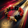 A detailed shot of the CosmicGlyph Aries bracelet against an opulent background of swirling red and gold light. The bracelet combines Tiger's Eye, Carnelian, and black stone beads connected by gold spacers and a dangling engraved tag, emitting a mysterious and luxurious aura.